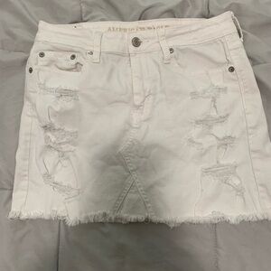 American Eagle Outfitters Light Cream Distressed Mini Skirt